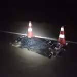 Colisão frontal entre moto e caminhão deixa dois mortos na BR-153